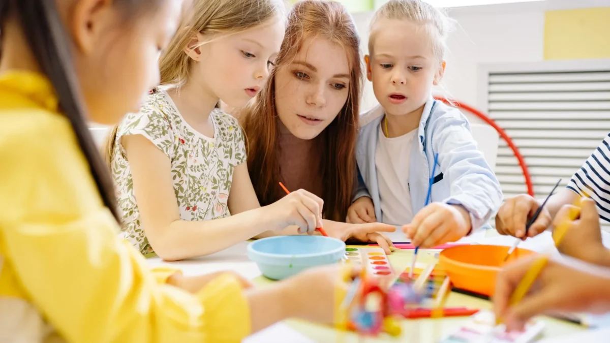 children working around table